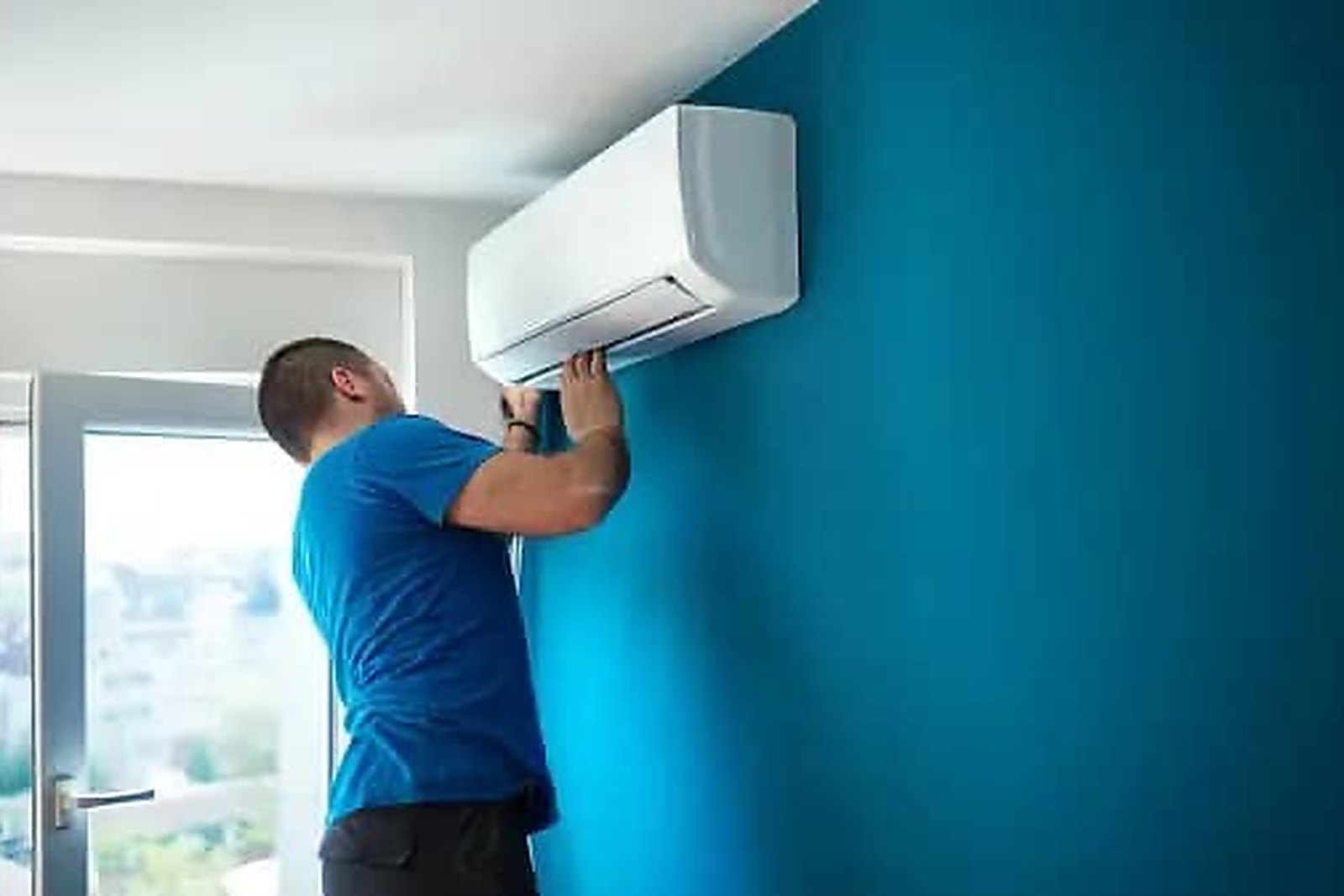 A wall mounted air conditioning unit installed in a Kent home