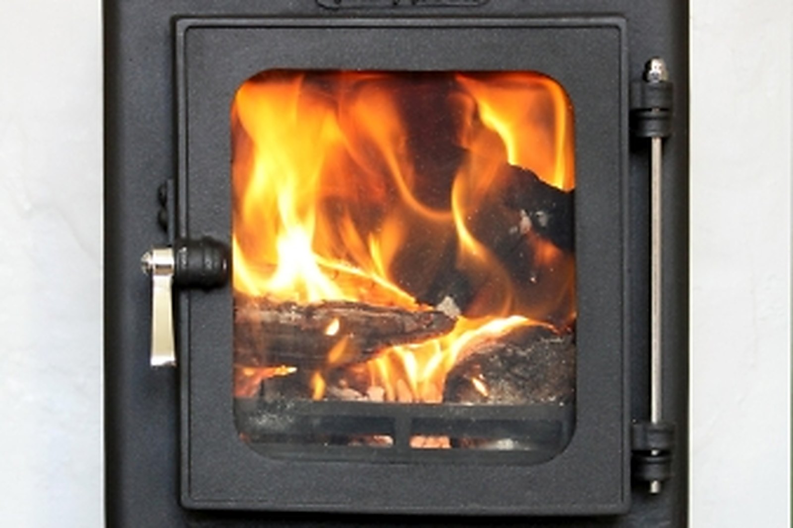 A Salamander Hobbit SE small cast iron stove on display at the Burham showroom